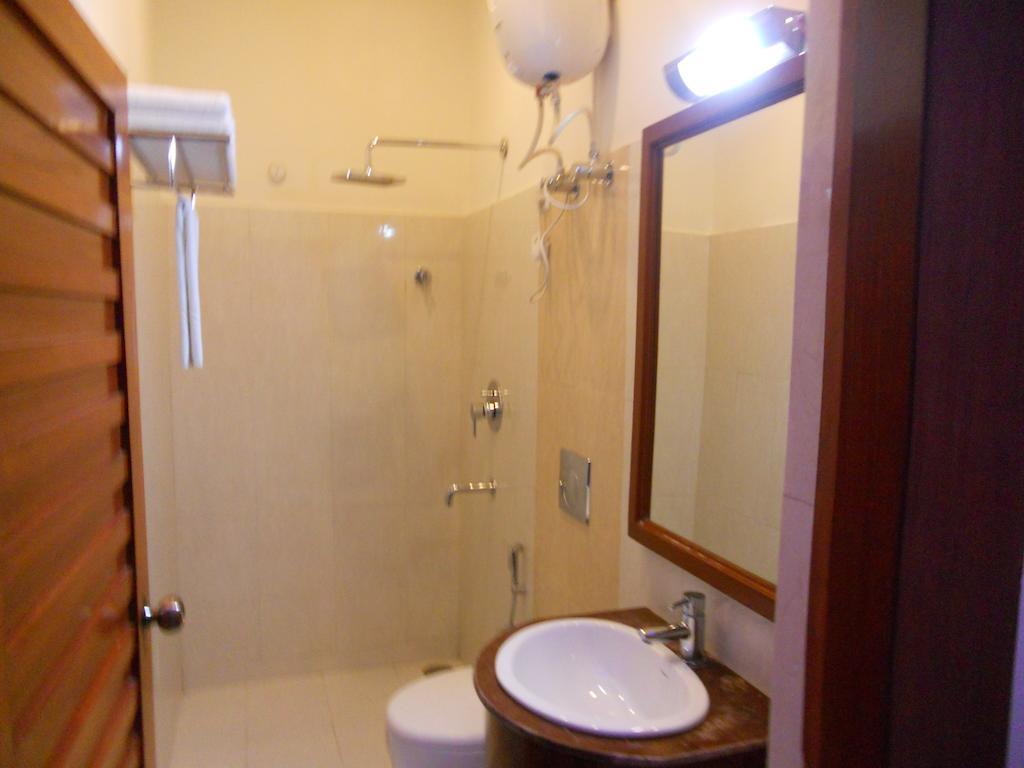ホテルPrayag Aristro Club コルカタ 部屋 写真